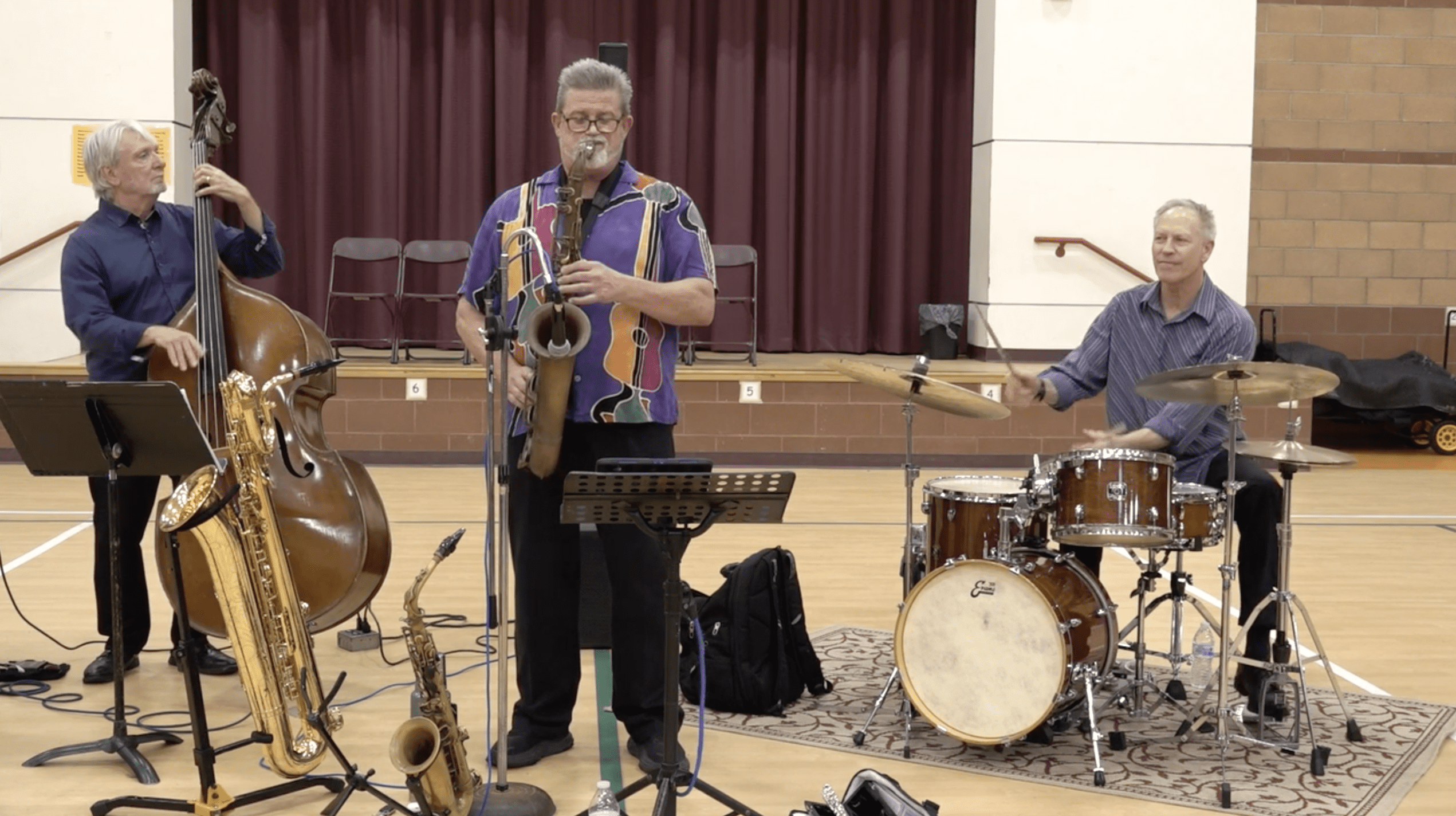 The 3D Trio preforming for students at Lillian Larsen Elementary School.