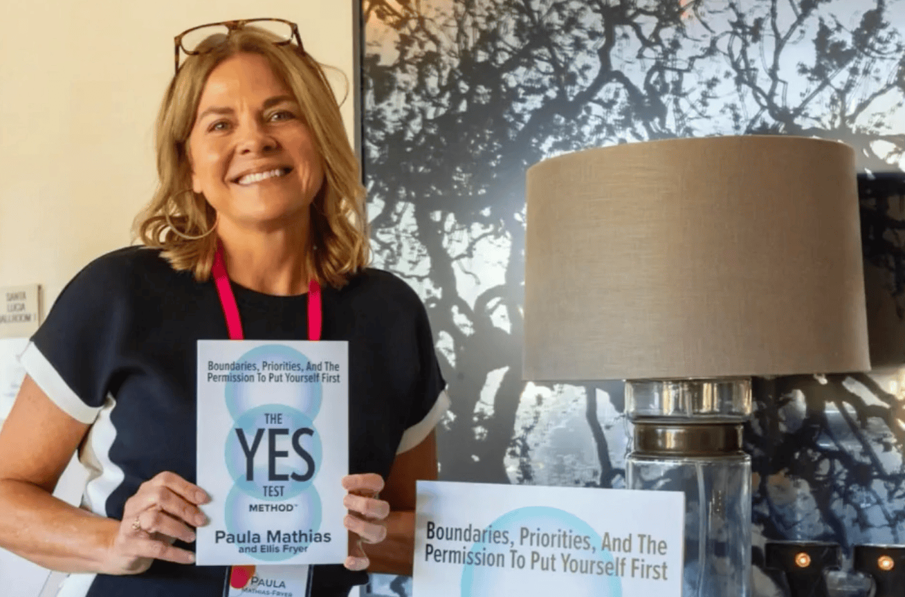 Keynote speaker Paula Mathias Fryer shares her most recent book, The YES Test Method.