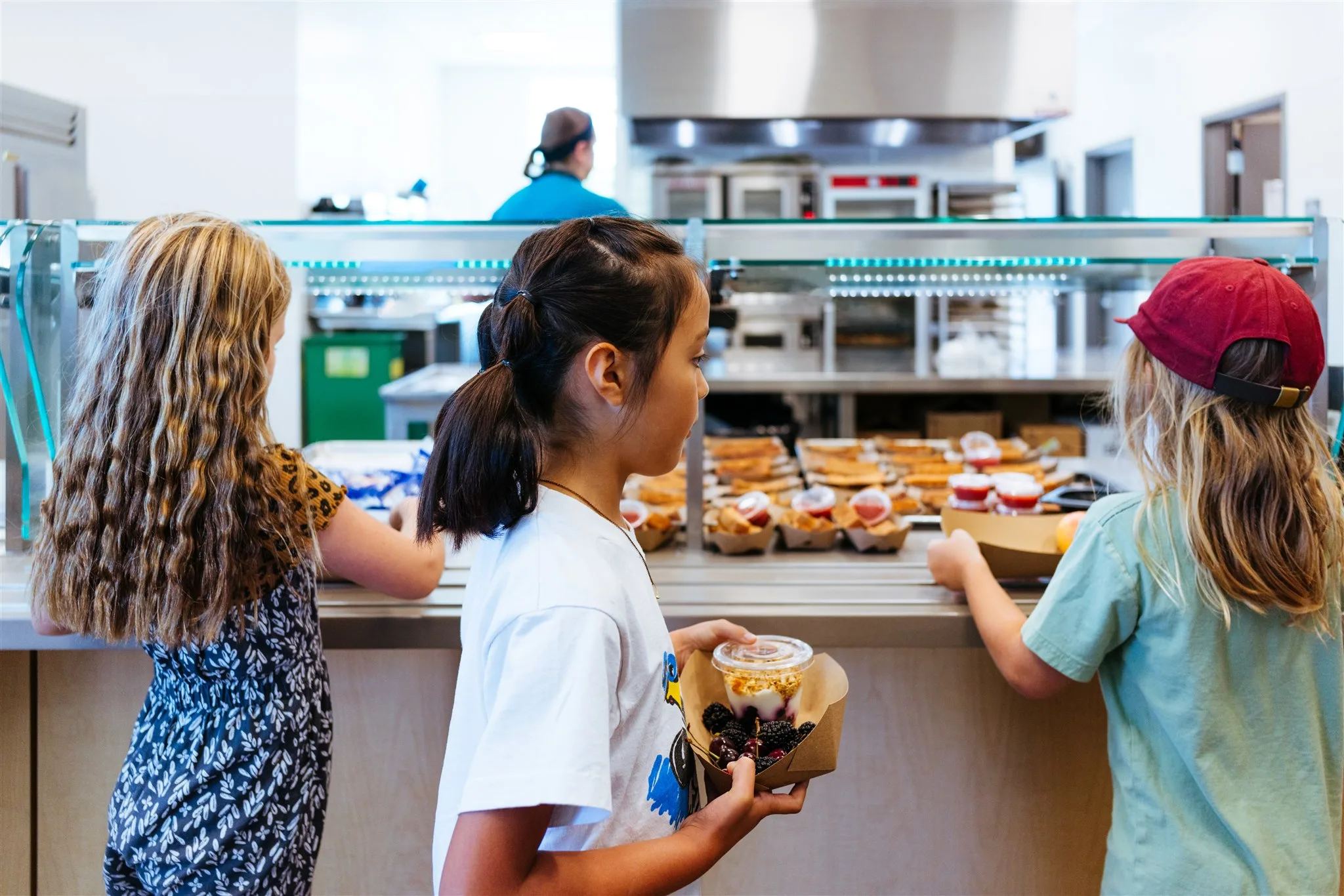 Children at school selecting their meals in the food line (photo courtesy of SLCUSD)